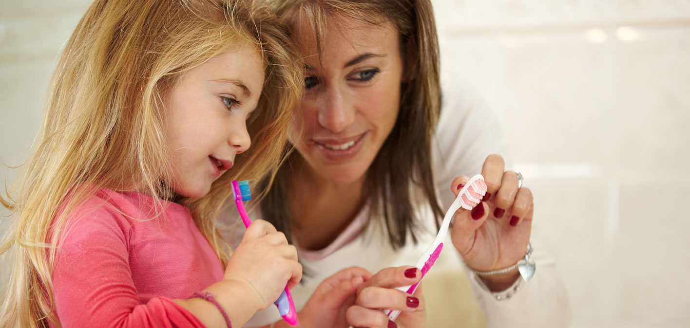 Family practicing good oral hygiene